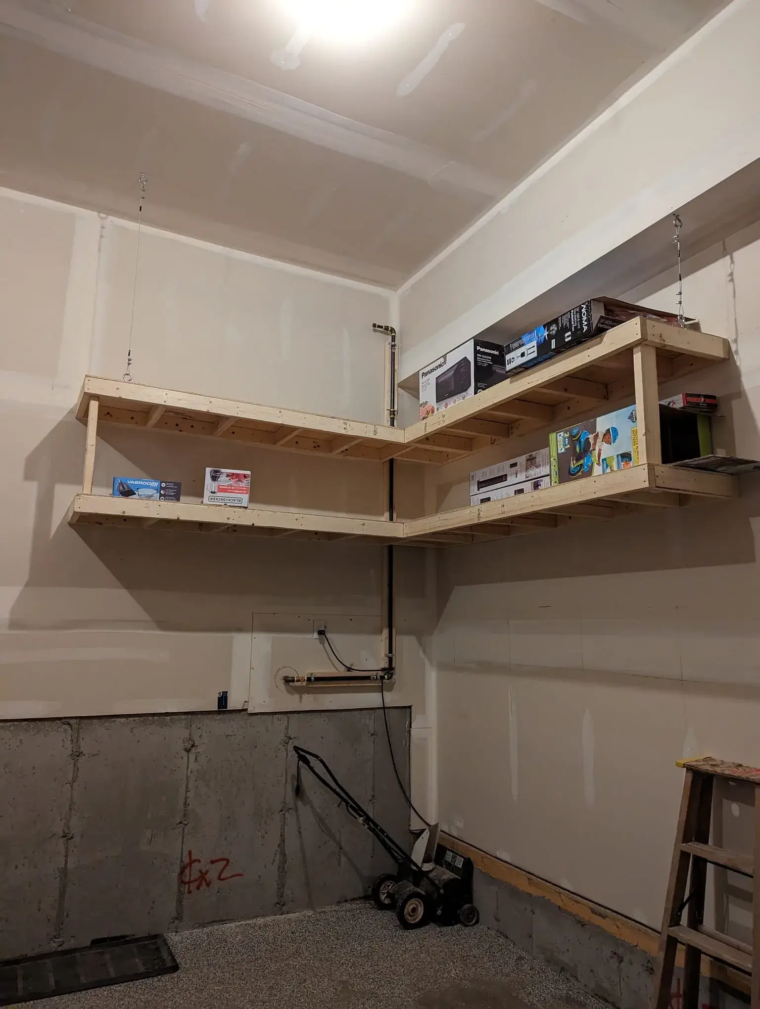 Completed garage shelving, loaded up