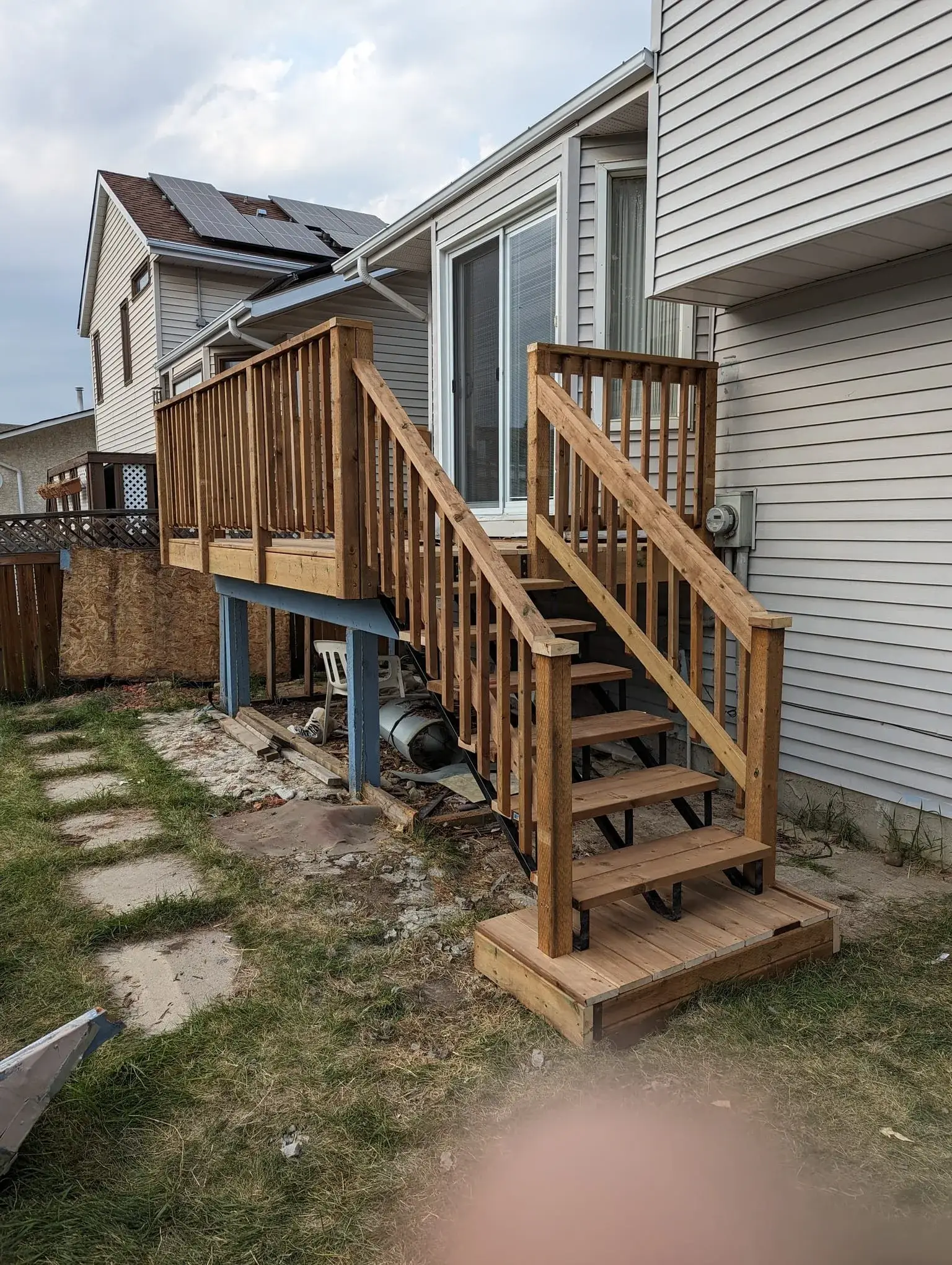 Elevated deck taking shape in the backyard